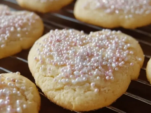 Freshly baked sugar cookies on a cooling rack