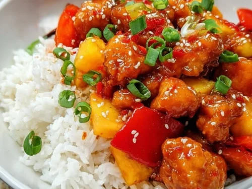 Delicious Sweet and Sour Chicken with Pineapple served on a plate